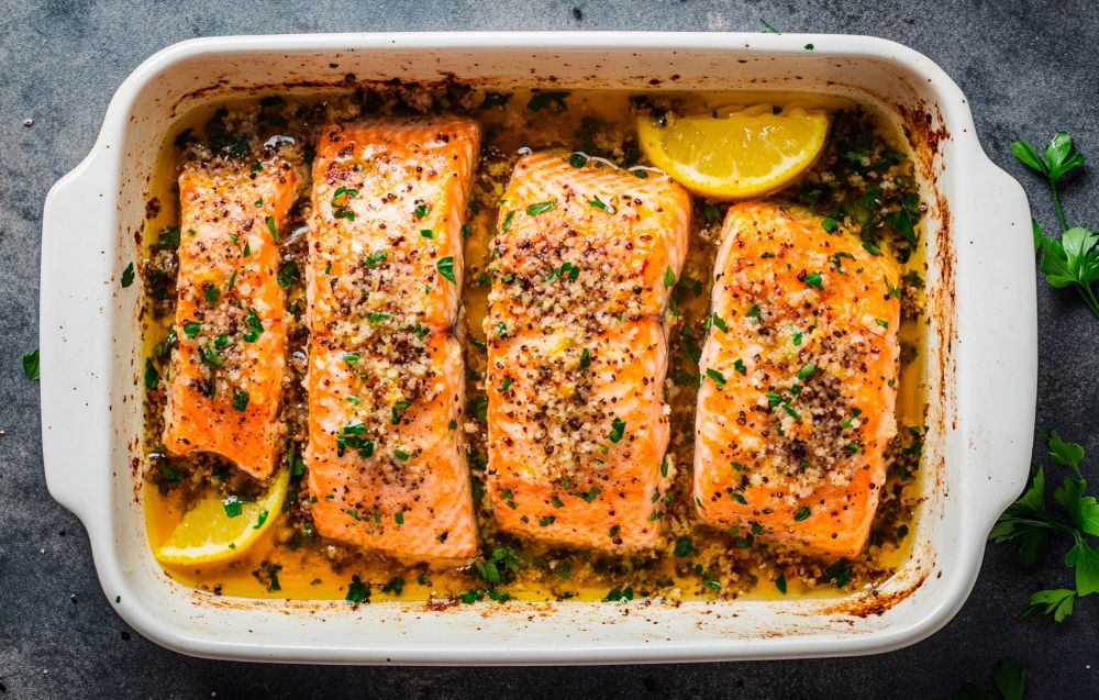 Perfectly cooked salmon baked at 350°F, showing flaky texture and golden edges for a delicious meal.