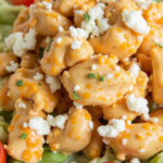 Colorful buffalo chicken salad recipe with juicy chicken, fresh vegetables, and tangy buffalo sauce